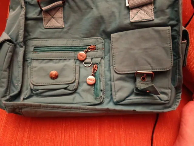 Bolso multiusos color verde azulado