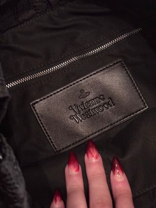 Bolso negro acolchado con estampado Orbe Saturno