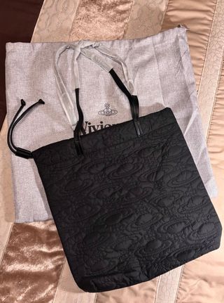 Bolso negro acolchado con estampado Orbe Saturno