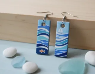 Pendientes largos de diseño olas y pez