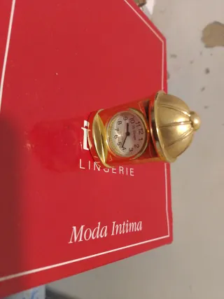 Mini reloj Le Temps dorado