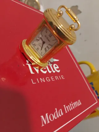 Mini reloj Le Temps dorado