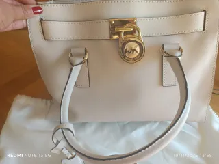 Bolso Michael Kors Beige con candado dorado