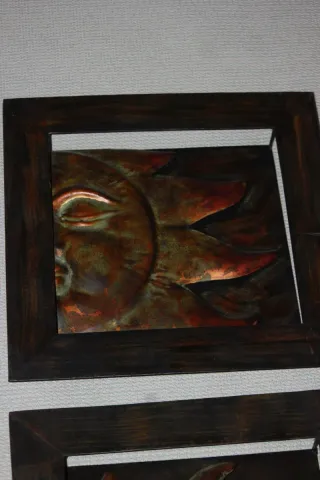 Quadri in metallo a forma di sole