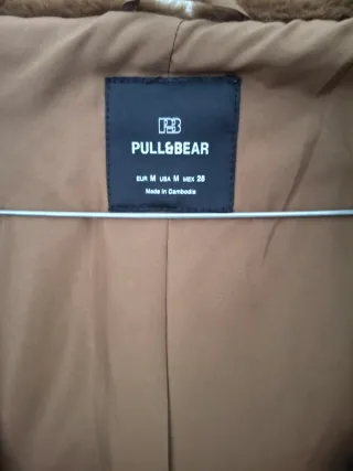 Cazadora pelo marrón con capucha