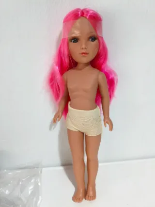 Muñeca pelo rosa ojos azules