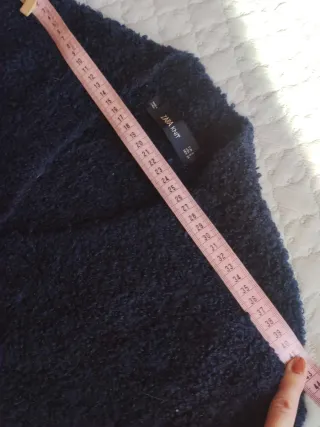 Jersey Zara azul con bolsillos de pelo artificial