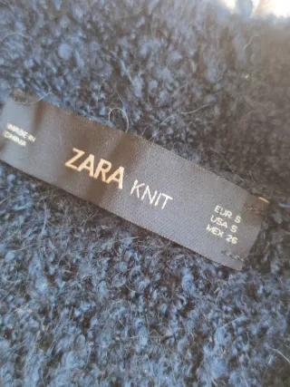 Jersey Zara azul con bolsillos de pelo artificial