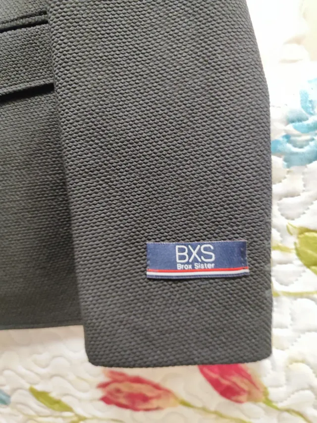 Americana con un solo uso. Esta intacta