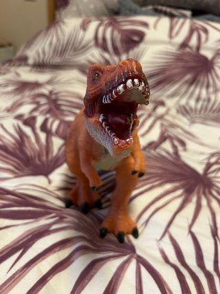 Dinosaurio de juguete con sonido