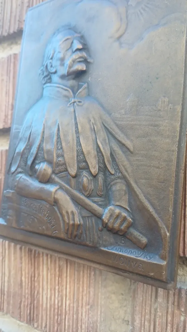 Placca di bronzo firmata