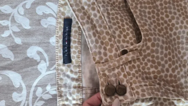 Pantalones estampados beige y marrón