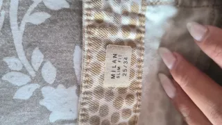 Pantalones estampados beige y marrón