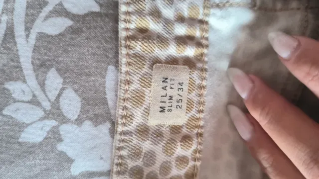 Pantalones estampados beige y marrón