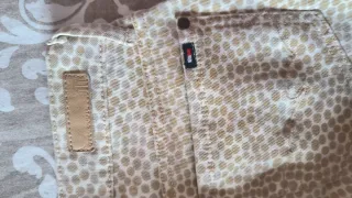 Pantalones estampados beige y marrón