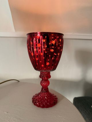 Portacandele in vetro rosso con stelle