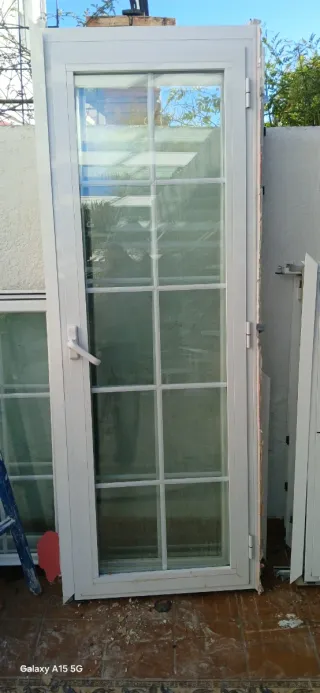 Puerta de aluminio con cristal climali