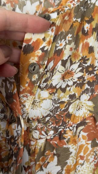 Blusa estampada floral manga larga