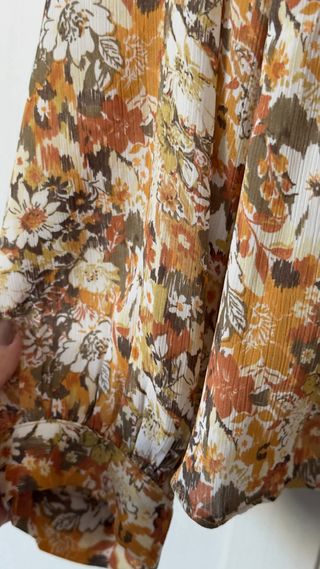 Blusa estampada floral manga larga
