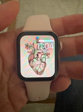 Apple Watch Serie 5 Rosa con celular, cargador