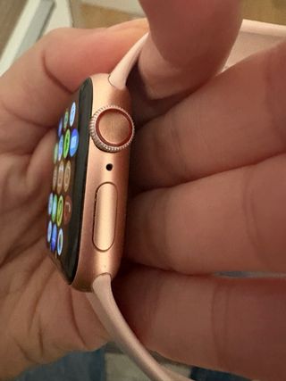 Apple Watch Serie 5 Rosa con celular, cargador