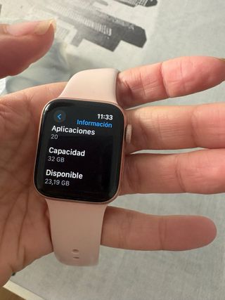 Apple Watch Serie 5 Rosa con celular, cargador