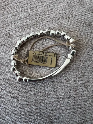 Pulsera Uno de 50 Goteando Plata