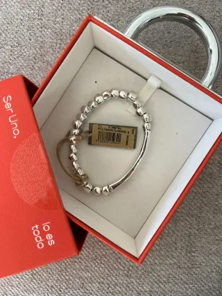 Pulsera Uno de 50 Goteando Plata