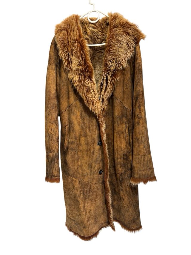 Cappotto lungo in pelliccia rovesciata