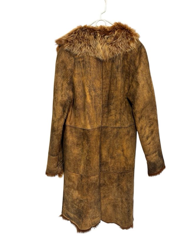 Cappotto lungo in pelliccia rovesciata