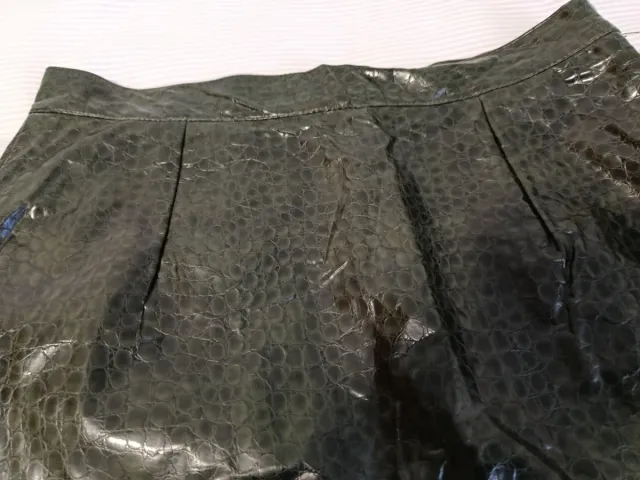 Falda verde oscuro efecto piel