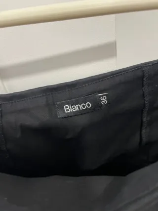 Vestido negro strapless con lazada S