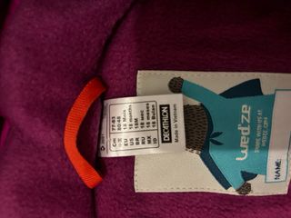 Mono de nieve Wedze niña rosa naranja