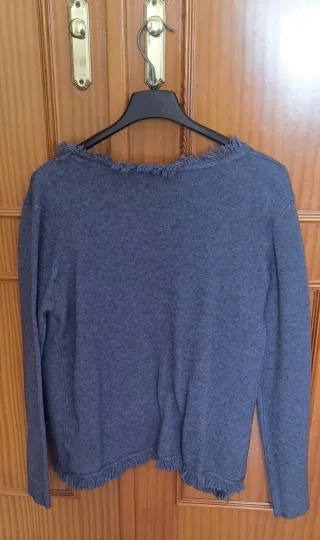 Chaqueta azul con flecos