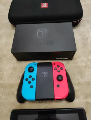 Nintendo Switch + Mando + Estuche + Base