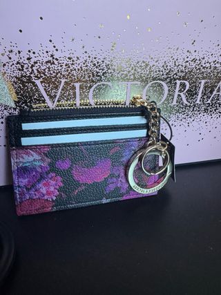 Cartera Victoria's Secret floral con llavero