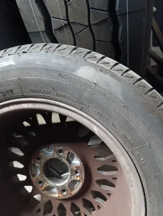 4 Bridgestone 195/65 R15 con llantas BMW