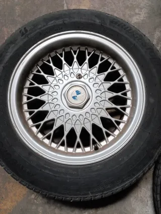 4 Bridgestone 195/65 R15 con llantas BMW