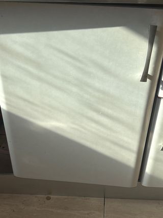 Muebles de cocina blancos y naranja