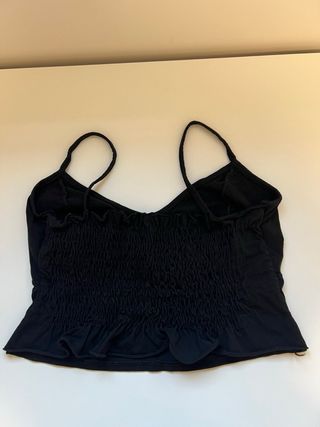 Top negro con botones