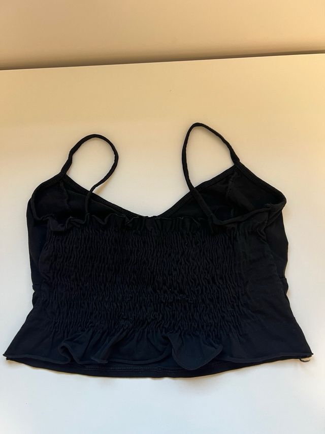 Top negro con botones