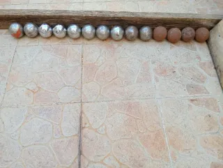 Bolas de Petanca Metálicas y de Arcilla