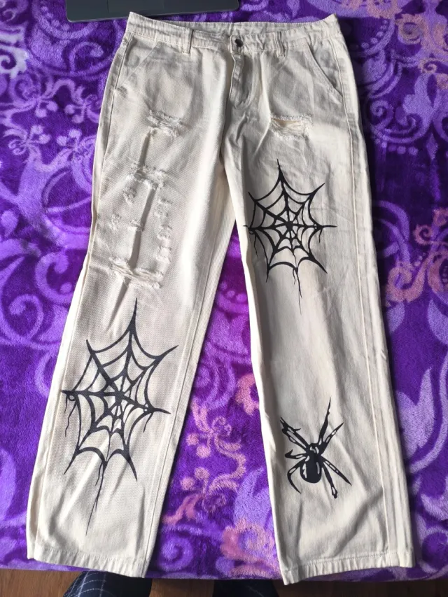 Vaqueros chico beige con arañas Talla M y 30