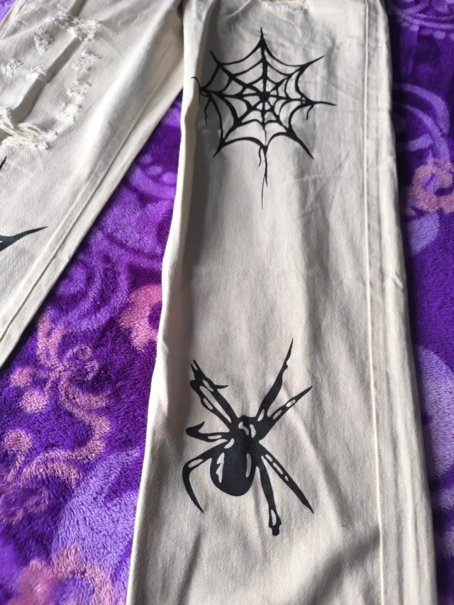 Vaqueros chico beige con arañas Talla M y 30