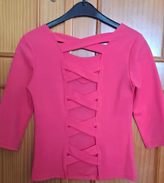 Blusa rosa fucsia con espalda cruzada