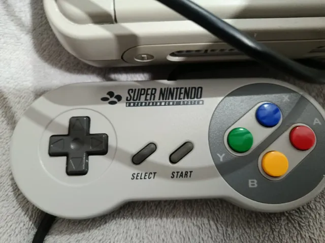 Super Nintendo con 2 mandos y Ever Drive con juego