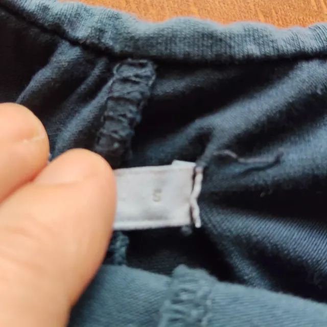 Falda subdued de pana verde azulado con volantes