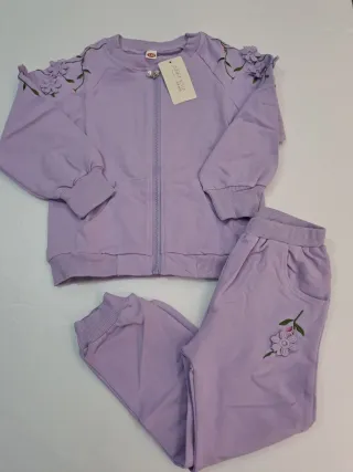 Completo bambina lilla con dettagli a fiori