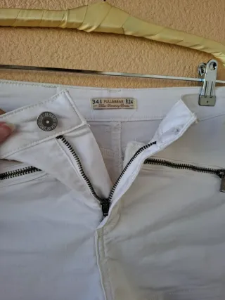 Short tiro alto cremalleras