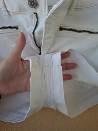 Short tiro alto cremalleras